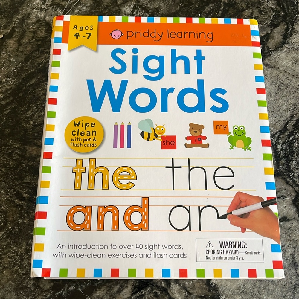 Priddy learning sight words book. Dry erase. Comes with one marker & flash cards